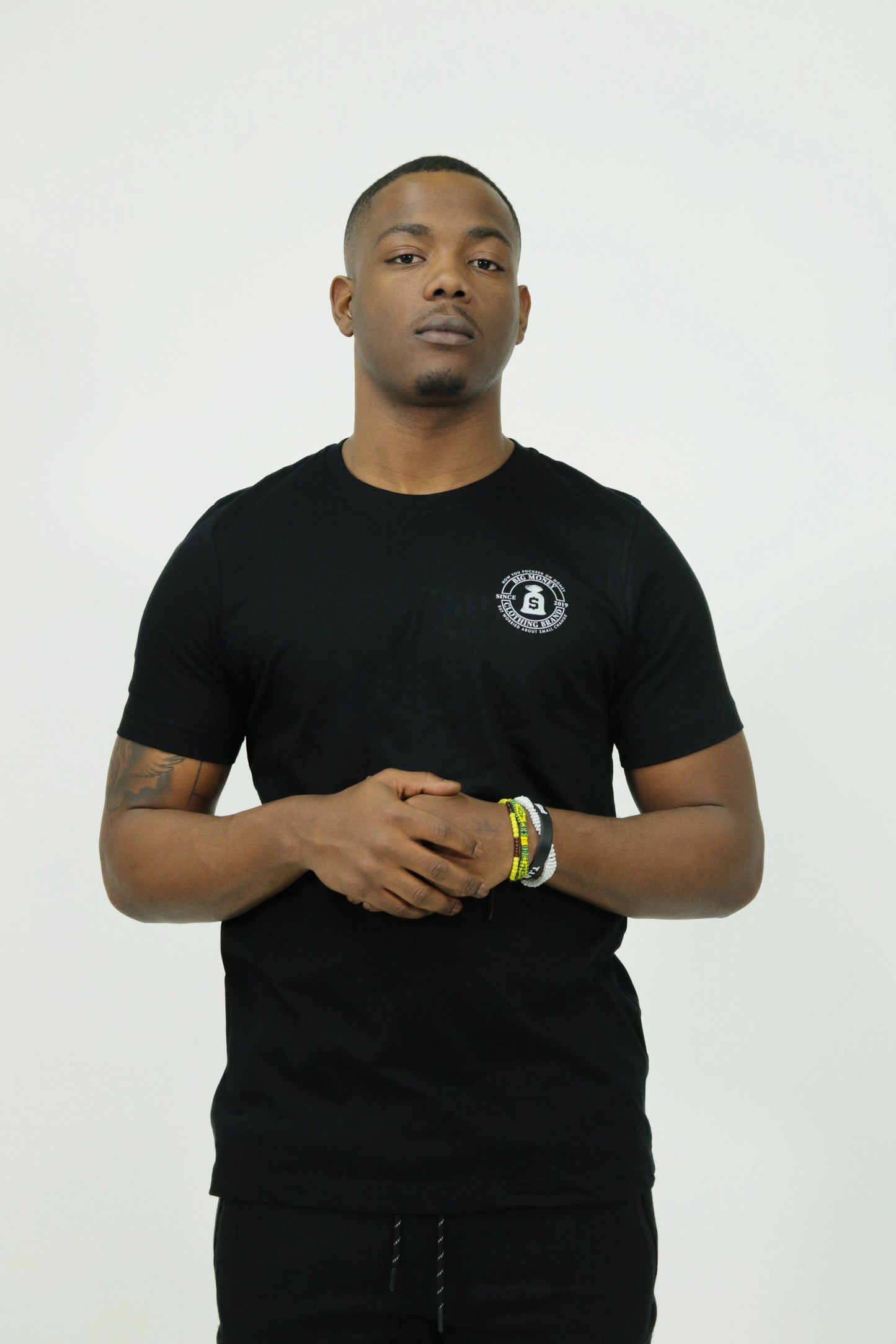 Black "BigMoney Small Change" logo Tee